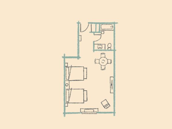 A simple floor plan with two beds, a bathroom, sitting area, and entrance. Furniture and fixtures are minimally depicted.