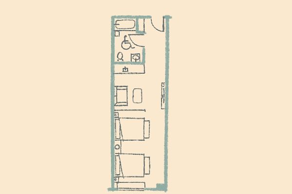 This is a simple floor plan layout with a bathroom, a kitchenette, and a living area, possibly for a small apartment or room.