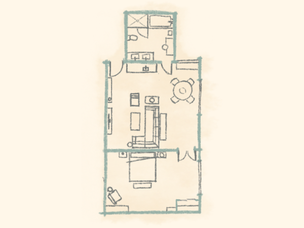 A hand-drawn floor plan sketch of a small apartment, showing rooms, furniture, and a circular dining area, on a pale beige background.