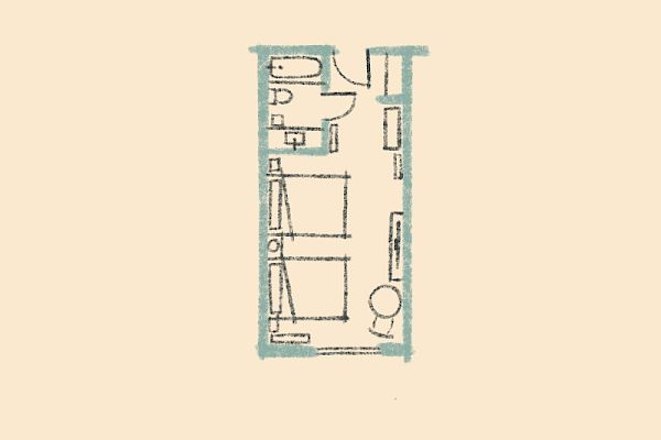 A simple architectural floor plan featuring a furniture layout with a bed, desk, and other elements in a compact rectangular space.