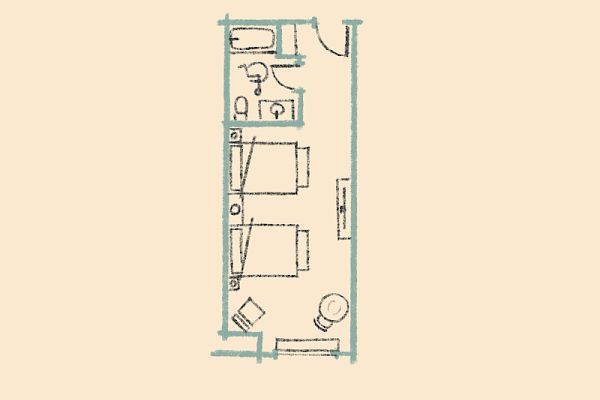 This image shows a basic floor plan layout with two beds, a bathroom, and a small sitting area.