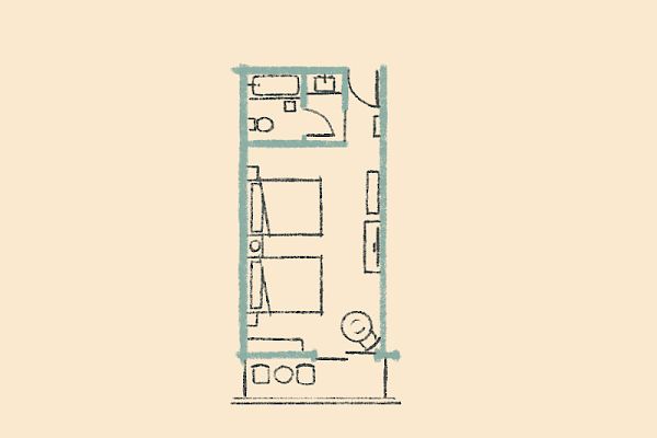 This image shows a simple floor plan with a small bathroom, a kitchenette, and a room with two beds.